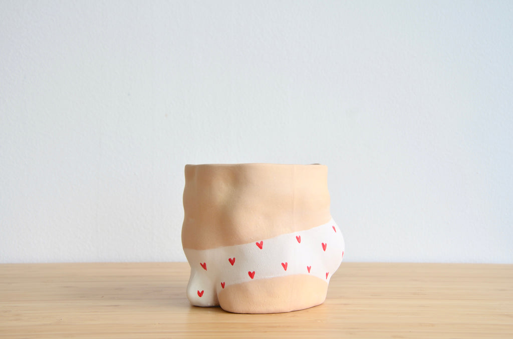 Group Partner Young Love boy planters in Singapore - handmade tableware