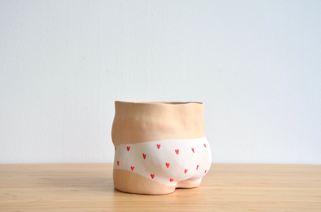 Group Partner Young Love boy planters in Singapore - handmade pot