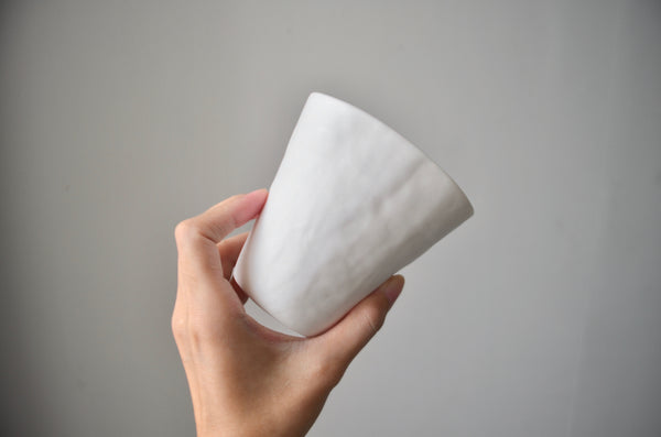 White hand-coiled porcelain beaker | Kira Ni