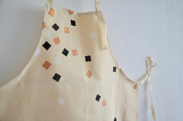 Handprinted aprons by Jackie Fazekas in Singapore