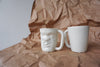 Ceramic handmade grumpy face mugs in Singapore
