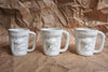 Ceramic handmade grumpy face mugs in Singapore