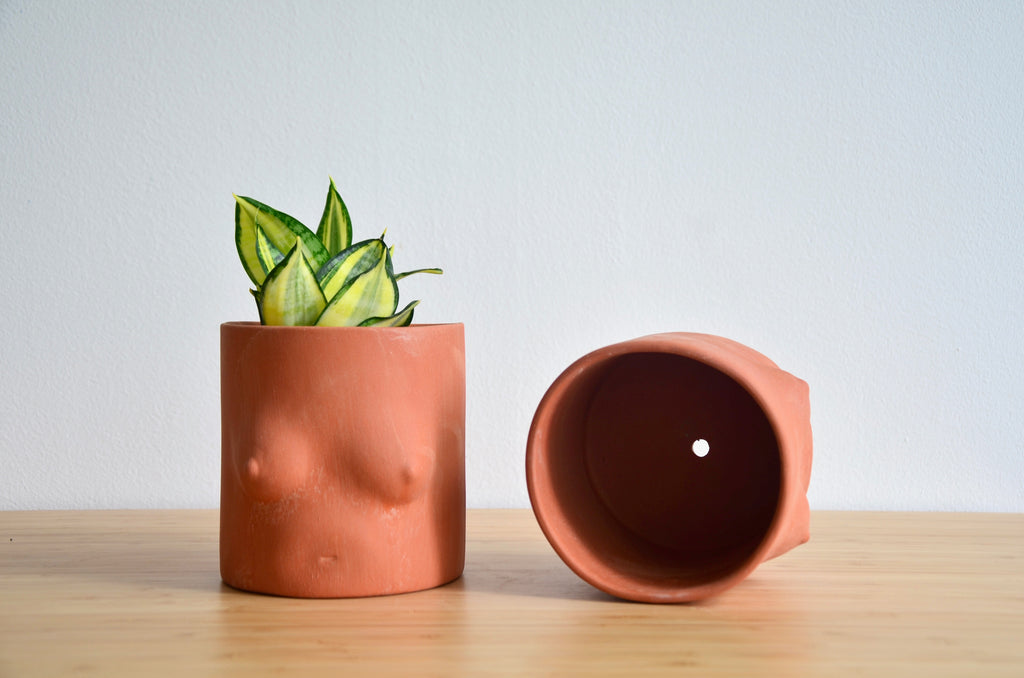 Group Partner terracotta girl planters in Singapore - handmade pot