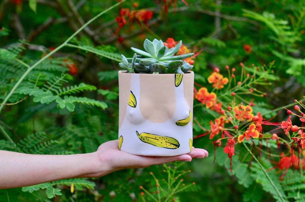 Group Partner Banana female planters in Singapore - handmade slipcast pot