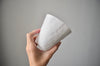 White hand-coiled porcelain beaker | Kira Ni
